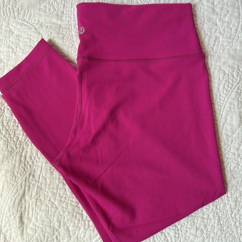 Pink Lululemon Wunder Train High-Rise Tight 25"
